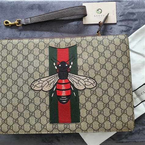 gucci bee print clutch|Gucci mini clutch.